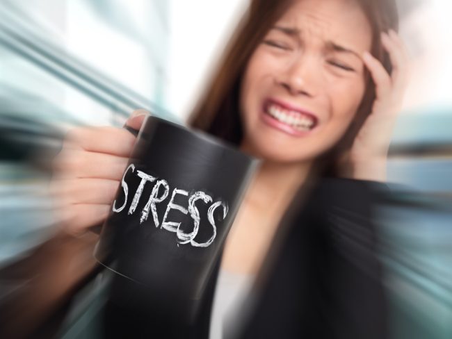 Stress – business person stressed at office